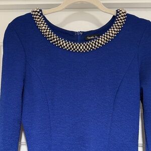 Elegant Blue Dress with Embellished Neckline